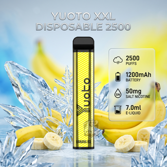 A Yuoto XXL disposable vape device in banana oil flavor, displayed on a reflective ice surface with sliced bananas and ice crystals. The background is a soft blue and yellow gradient with text detailing the product specifications: 2500 puffs, 1200mAh battery, 50mg salt nicotine, and 7.