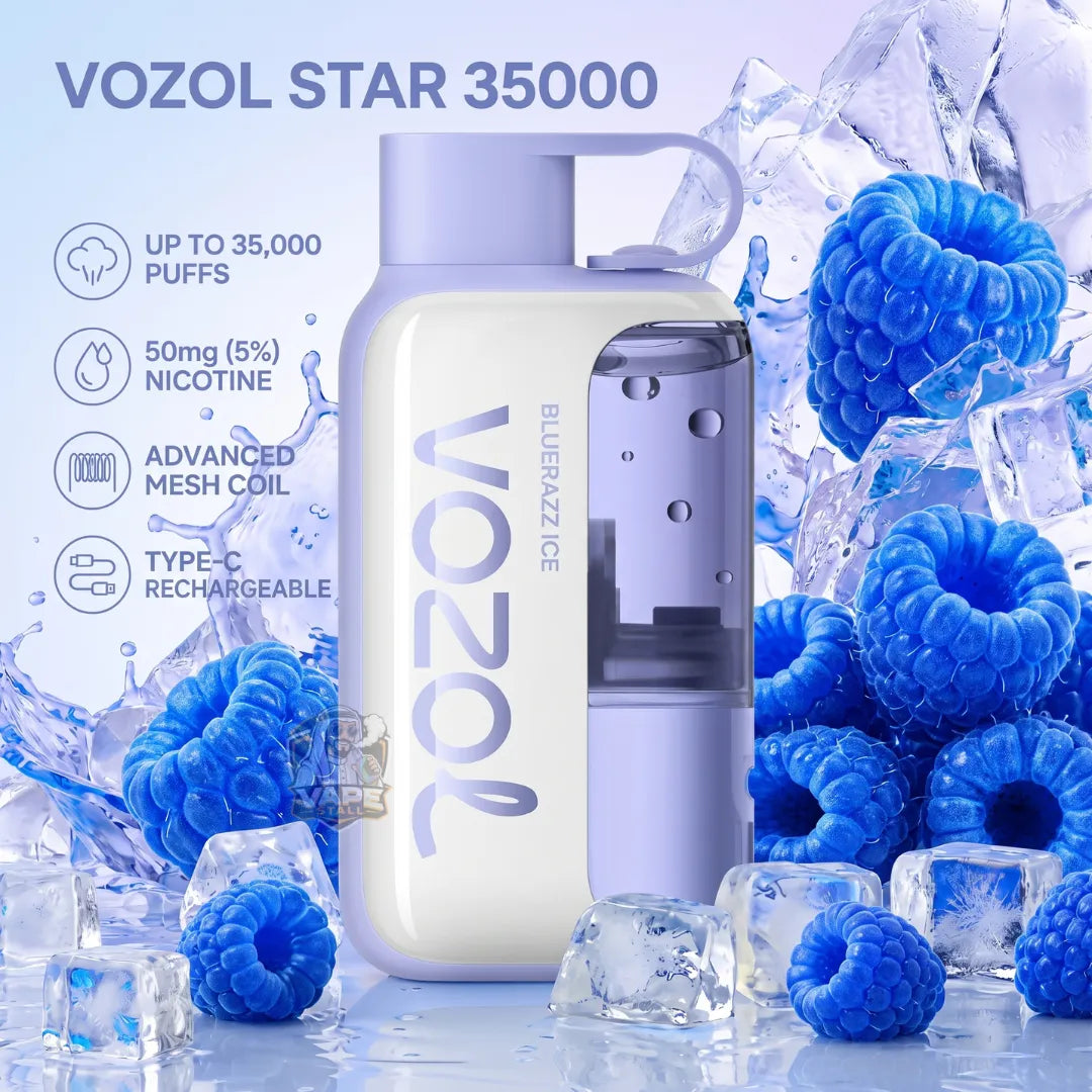 A Vozol Star 35000 disposable vape device in a light lavender and white color scheme, surrounded by ice cubes and fresh blue raspberries. The image features promotional text highlighting its 35,000 puffs capacity, 5% nicotine strength, advanced mesh coil, and type-C rechargeable feature.