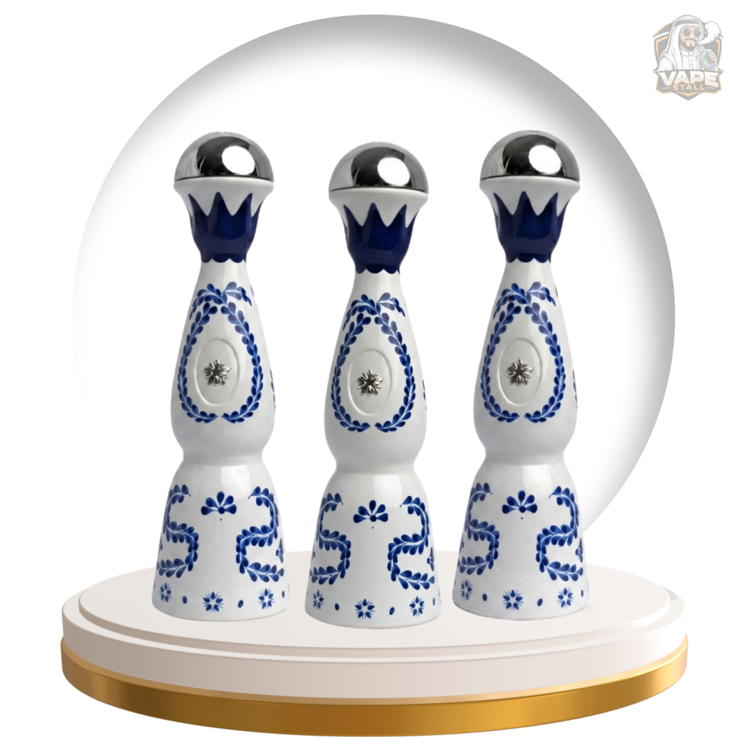 Buy Humo Azul 24000 Puff 20mg Disposable Vape in UAE, Three decorative items with blue patterns inside a transparent dome on a white background