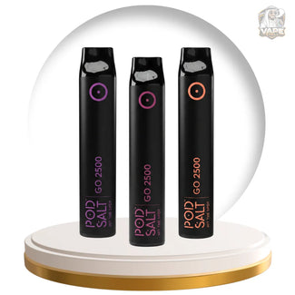 Three black POD SALT GO 2500 disposable vape devices with different colored circular icons (purple, pink, and orange) displayed on a white and gold rotating platform.