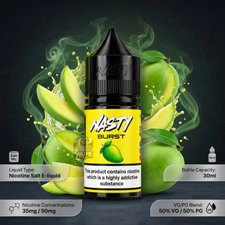 A bottle of NASTY BURST e-liquid centered against a dark background with sliced mangoes, green mango splashes, and smoke effects. The bottle has a black cap and a bright yellow label with the NASTY BURST branding and a mango illustration.