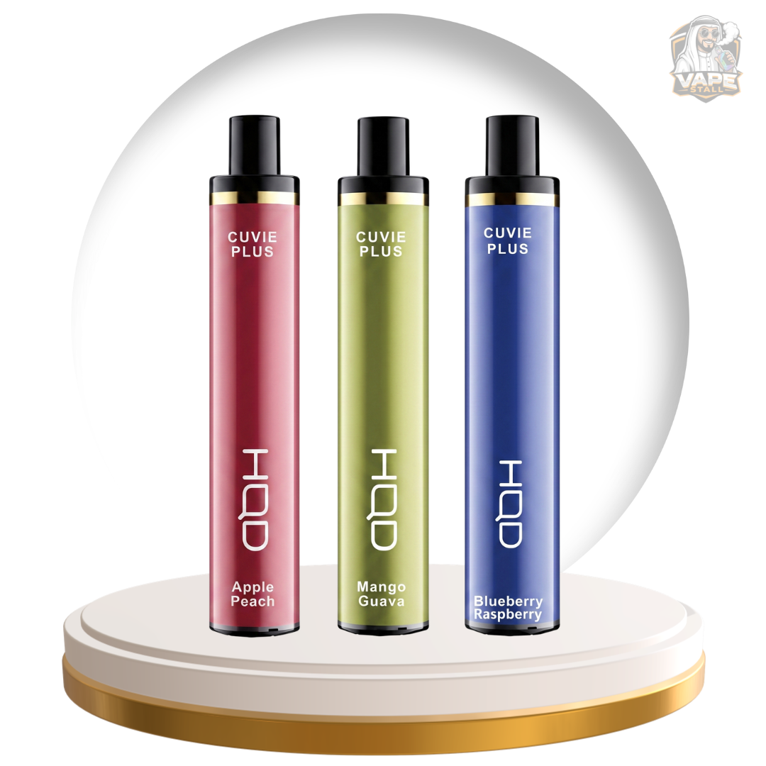 Three Cuvie Plus vape devices in Apple Peach, Mango Guava, and Blueberry Raspberry flavors, displayed on a gold and white circular pedestal against a white background with a circular graphic backdrop.
