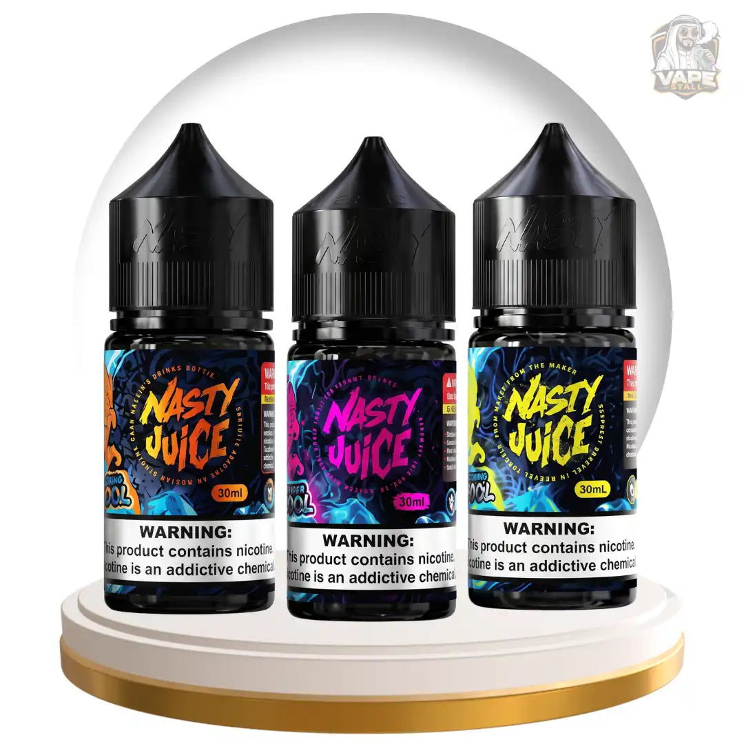 Three bottles of Nasty Juice e-liquid displayed side by side inside a clear dome on a white and gold circular pedestal. The bottles have black caps and colorful labels with 'NASTY JUICE' in neon lettering, with nicotine strength labels of 30mg, 50mg, and 10mg.
