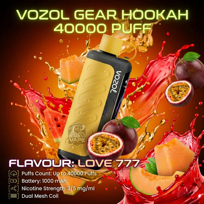 Vozol Gear Hookah 40000 Puff disposable hookah device in Love 777 flavor, featuring a gold and black body with a gold mouthpiece, surrounded by fruit slices and red liquid splashes on a dark background.